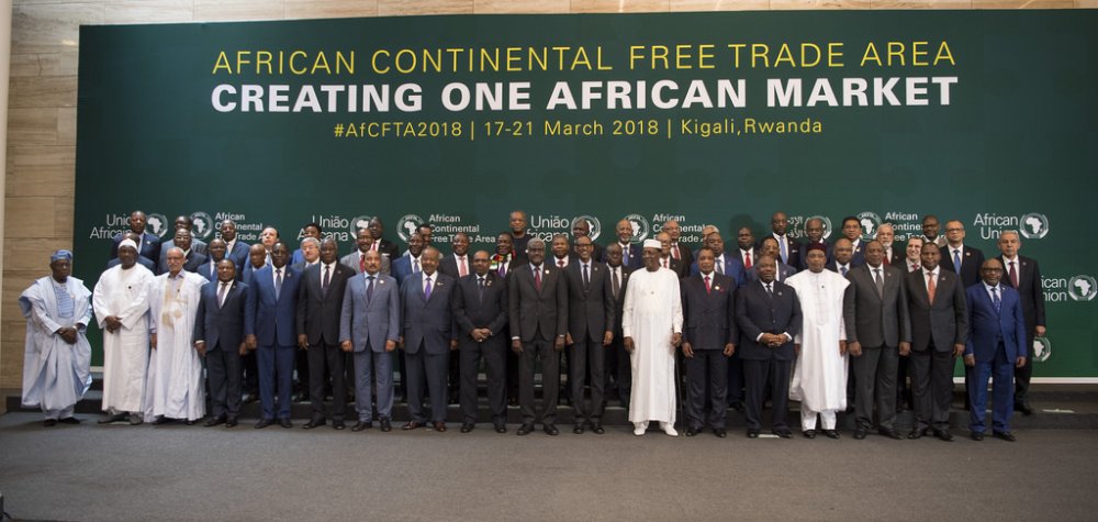 Different Heads of States and governments take a group photo after the signing ceremony 