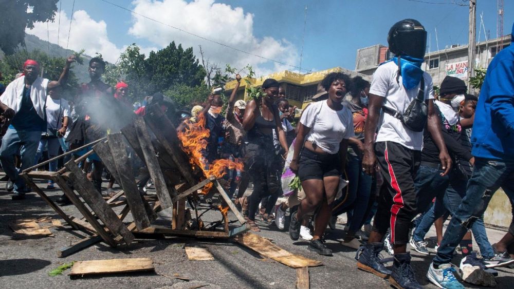 Haitians in protests against violence.