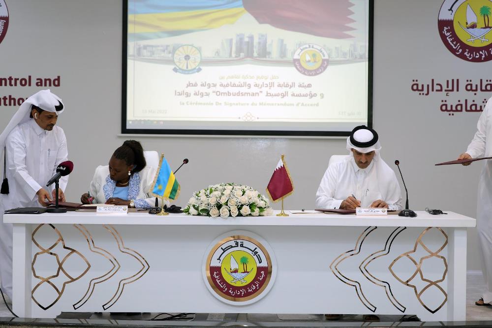 Hamad Bin Nasser Al-Misnad and the Chief Ombudsman of Rwanda signing the MoU. 