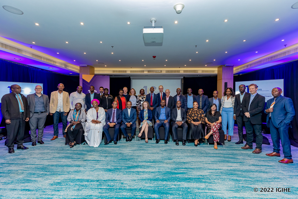 Participants of 10-year anniversary celebrations in a group photo. 