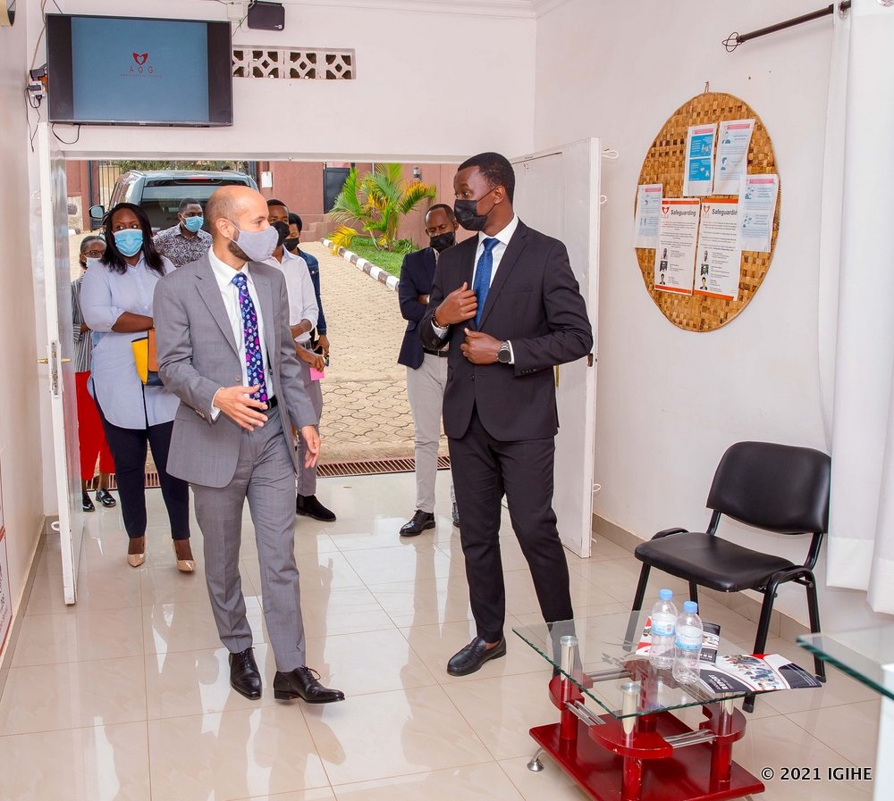 Amb. Omar receiving explanation on activities carried out by AOG Rwanda.  