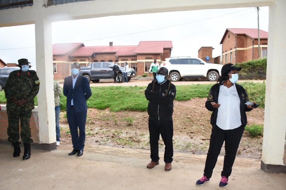 Governor Habitegeko (second from right) with other officials visiting Rugabano model village.