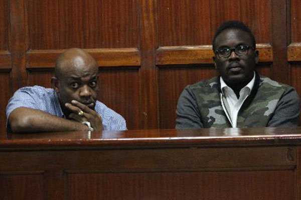 Morgan Kamande (left) and Ronald Nsale in a Nairobi court on April 6, 2017 during the hearing of a case in which they are accused of hacking into databases of banks.