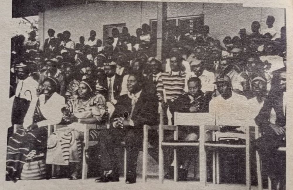 Former President Juvénal Habyarimana addressed a rally of his party, the National Republican Movement for Democracy and Development (MRND) on November 15, 1992, in Ruhengeri town. His wife, Agathe Kanziga sitting immediately at his right-hand side during this rally, was the only high-ranking figure wearing the Interahamwe uniform.