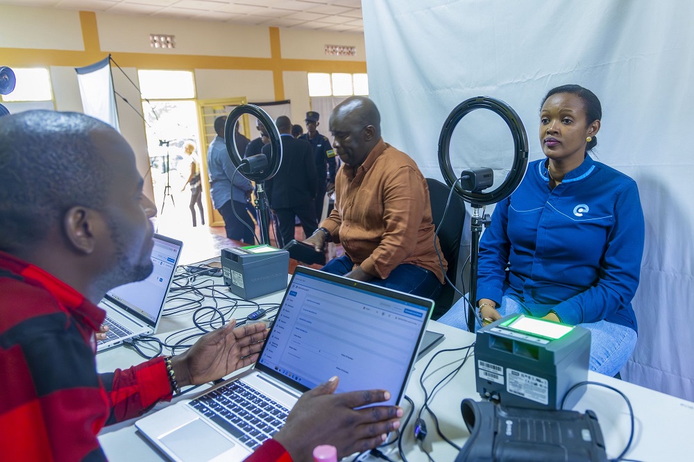NIDA Director General Josephine Mukesha (right) gets photographed during digital ID enrolment at Rugando cell office in Kimihurura, Kigali on February 7, 2025.