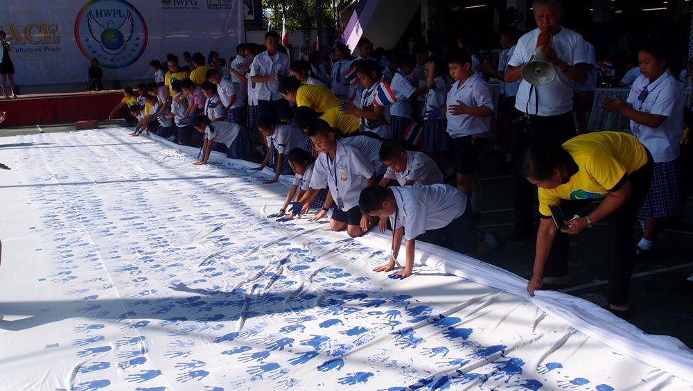 Students making paintings.