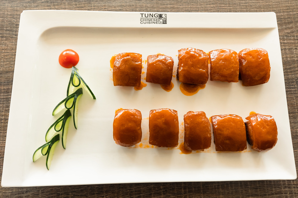 The menu boasts an assortment of meats, featuring the succulent Dongpo Cubed Pork.