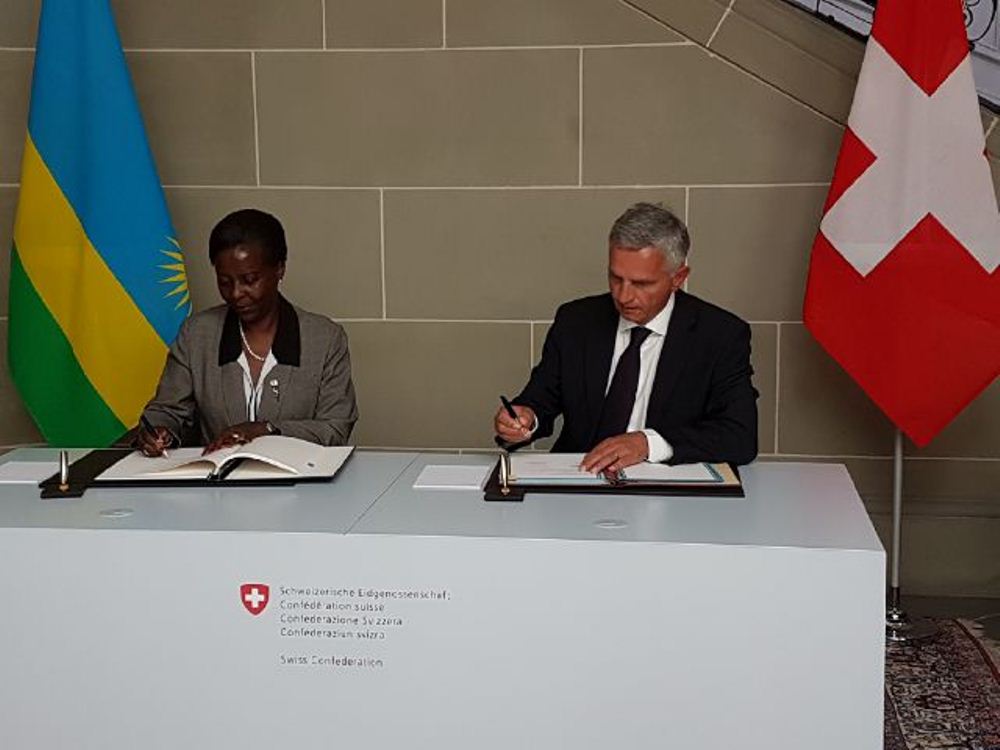 The Minister of Foreign Affairs, Louise Mushikiwabo and her Swiss counterpart Didier Burkhalter signing agreements yesterday.