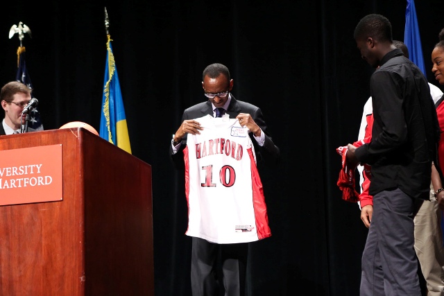 Students at the University of Hartford present gifts to President Kagame