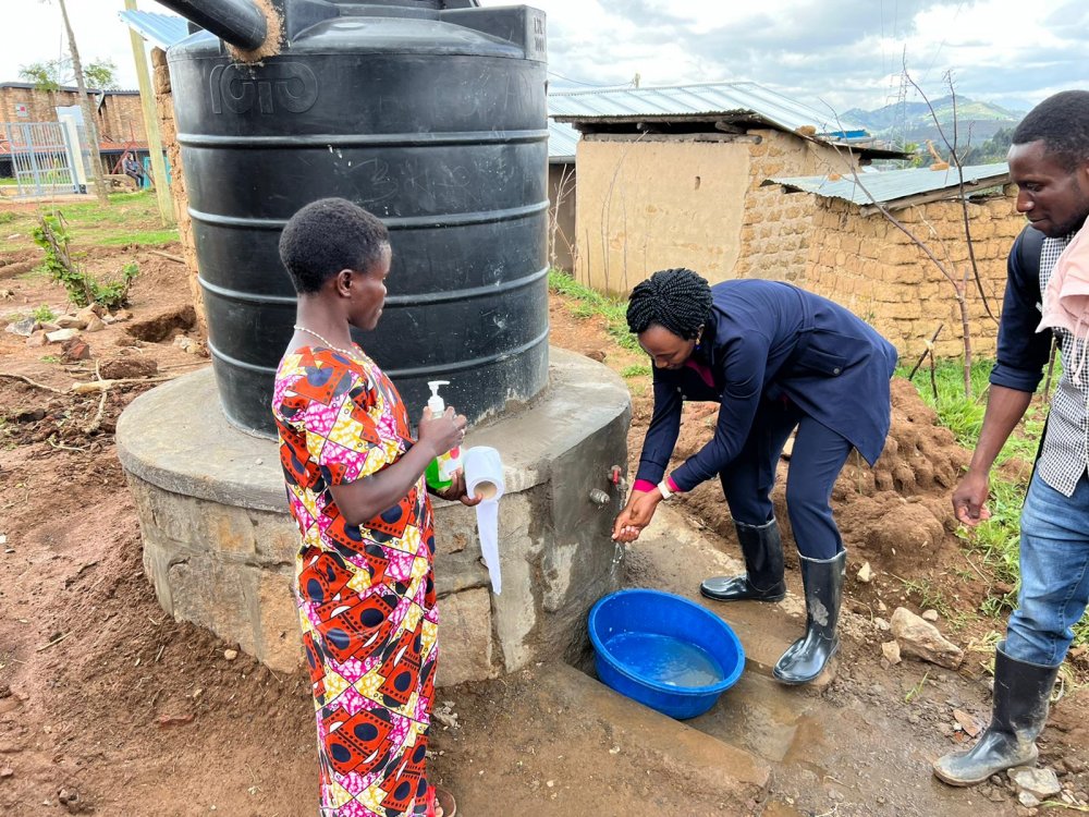 Gicumbi Vice Mayor for Economic Affairs, Parfaite Uwera at the inauguration of donated water tanks.