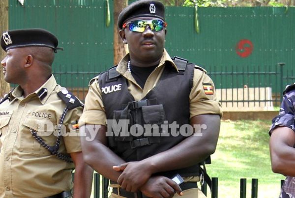 ASP Albert Muhumuza (right) stands next to Regional Police Commander for Kampala East, Mr Siraje Bakaleke on duty in Kampala recently.