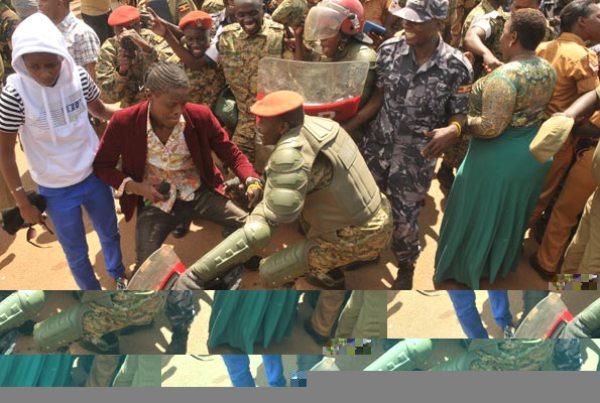 Musician Joseph Mayanja, aka Chameleone (2 Left) entertains soldiers during the gathering at Kololo in Kampala at the weekend.