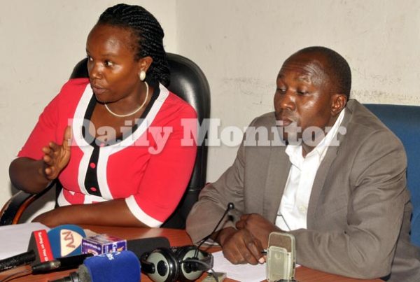 Forum for democratic change women leader Ingrid Turinawe (L) addressing the media yesterday at the party headquarters as the party secretary general Nathan Nandala Mafabi (R) looks on.