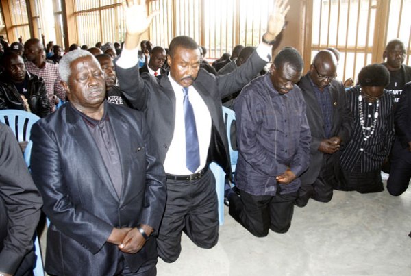 Left to Right: FDC leaders Wasswa Biriggwa, Mugisha Muntu, Kizza Besigye, Wafula Oguttu, Cecilia Ogwal and other members attend the party’s weekly prayers which were held as part of the defiance campaign recently.