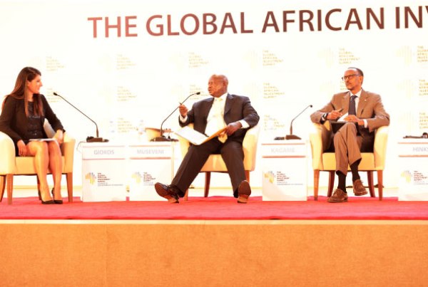 President Museveni (C) and his Rwandan counterpart Paul Kagame discuss during a session moderated by CNN journalist Eleni Giokos (L) at the Global African Investment Summit in Rwanda yesterday.