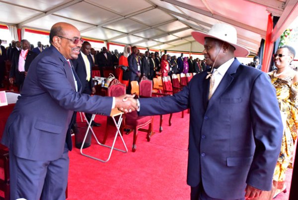 President Museveni (Right) greets Sudan’s Omar-al-Bashir at the former’s inauguration in Kampala last week.