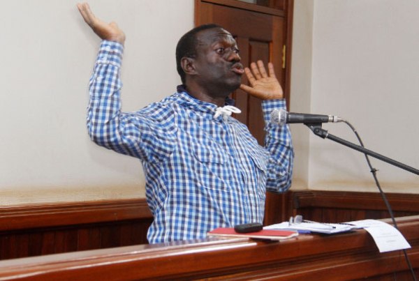 Former FDC presidential candidate Kizza Besigye in the dock at Nakawa court as he submitted his application on Wednesday.