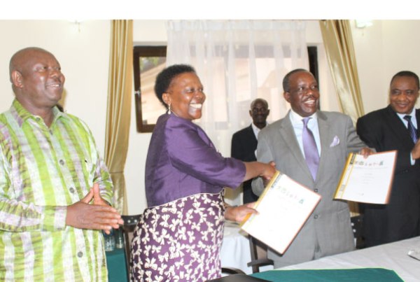 Energy minister Irene Muloni (2nd left), her Tanzanian counterpart, Prof Sospeter Muhongo (2nd right) and Energy permanent secretary Kabagambe Kaliisa (left) during the meeting in Hoima Town on Tuesday.