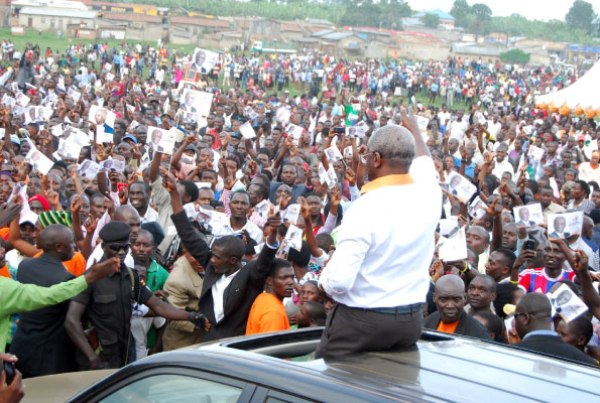 Go Foward presidential candidate Amama Mbabazi waves to his supporters at Kizinda playground during his campaign rally in Bushenyi District on Friday.