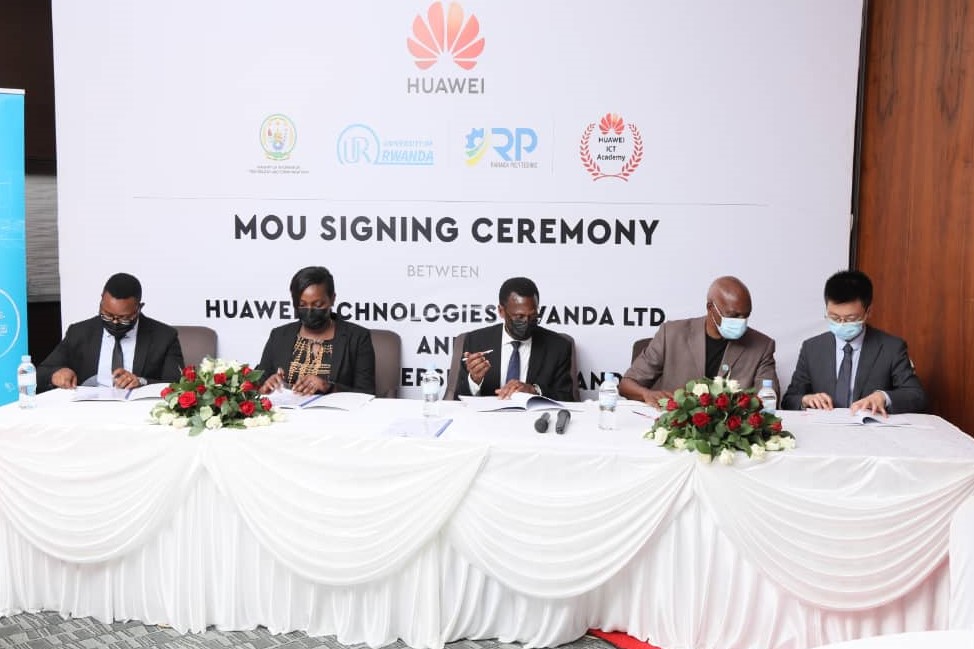 From left to right: Yves Iradukunda, Claudette Irere, Dr. James Gashumba, Prof. Lyambabaje Alexandra and Tonni Yang Shengwan signing the MoU.