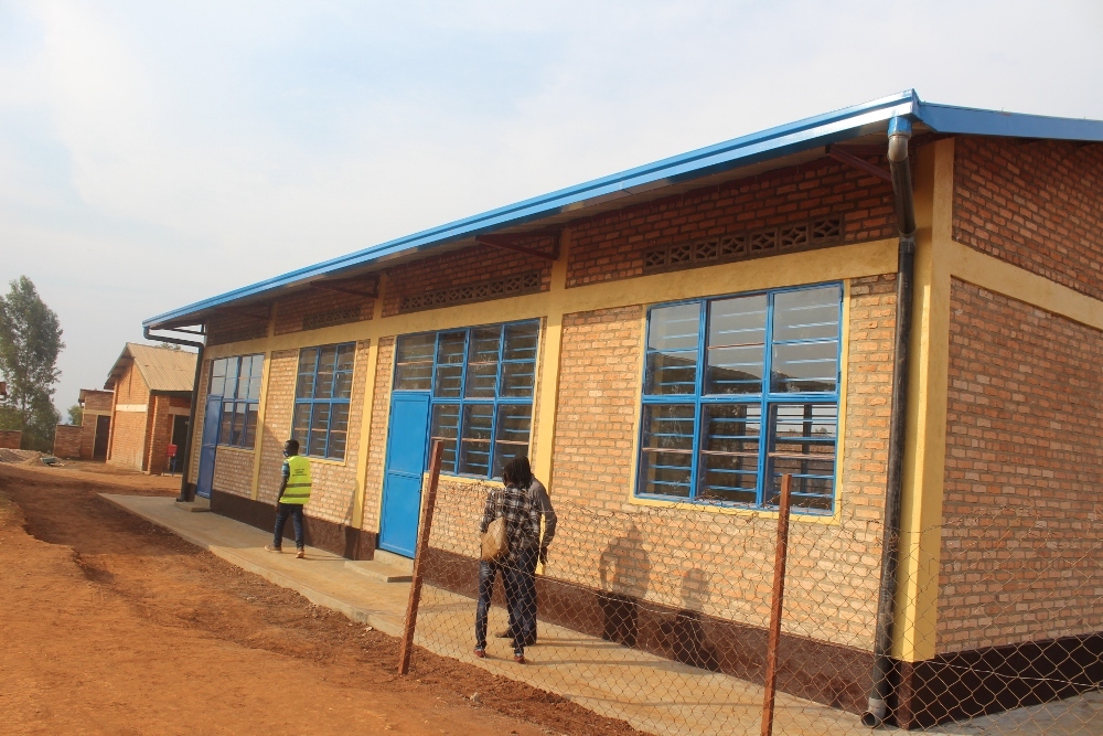 Gisagara District Deputy Mayor Jean Paul Habineza presented to the administration of Shyanda Primary School in Save Sector nine new classrooms and 10 toilets.