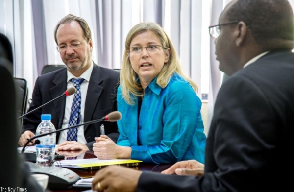Redifer (C) addresses a joint media briefing with government officials at the Ministry of Finance and Economic Planning offices in Kigali yesterday.