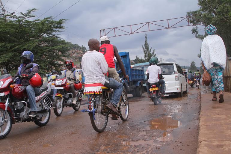 Passengers crossing Nyabugogo bridge