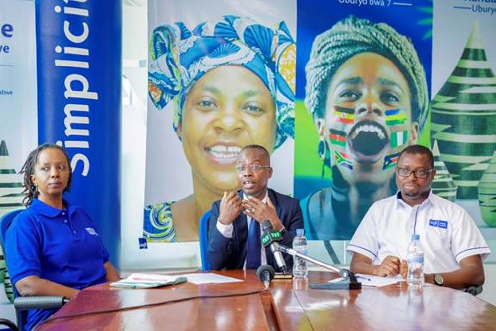 igo Rwanda Chief Executive Officer, Philip Amoateng (C), speaks during a press briefing