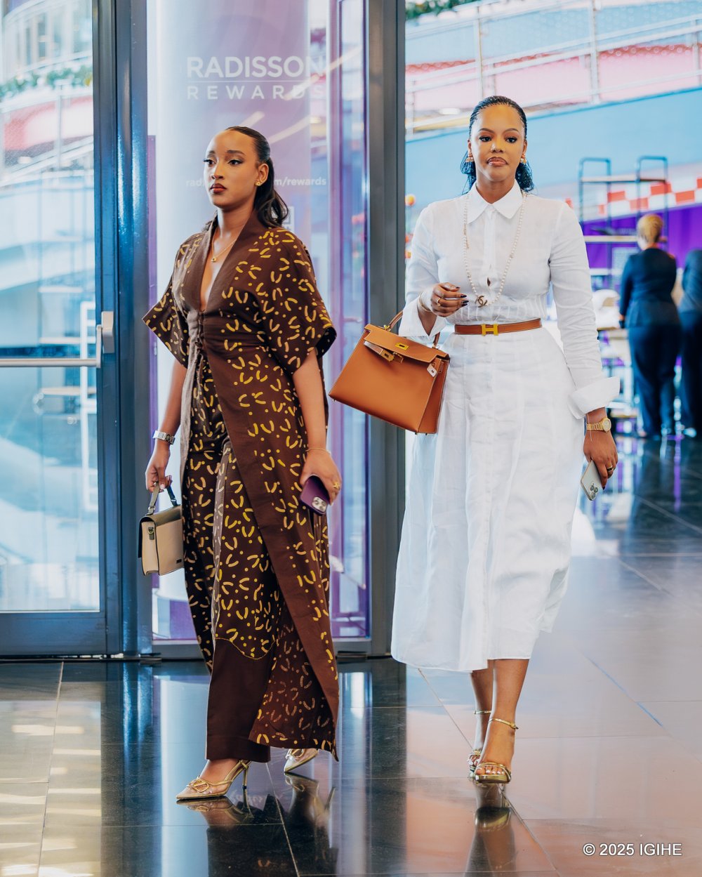 Miss Jolly Mutesi made her entrance at the book launch alongside Miss Muheto Nshuti Divine.