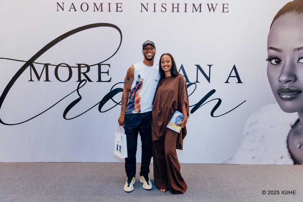 Miss Nishimwe Naomie and Adonis Filer snapped a keepsake photo together.