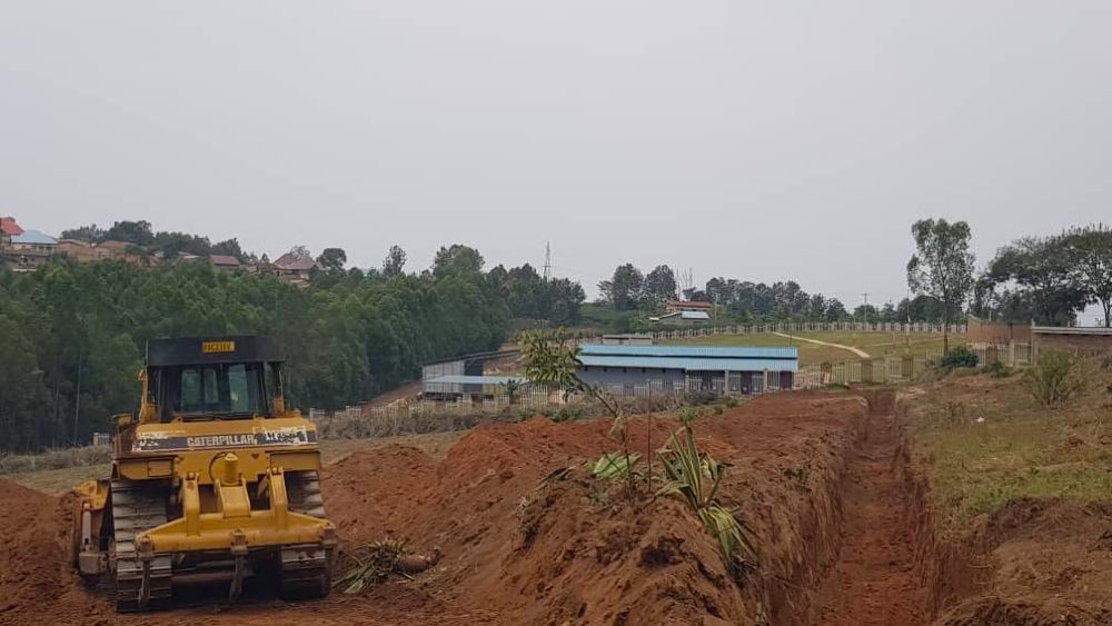 Heavy machinery is actively engaged in the ongoing works.