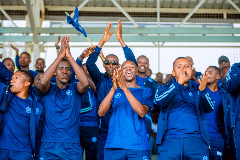 Police FC fans cheer their team as it cruises past AS Kigali.