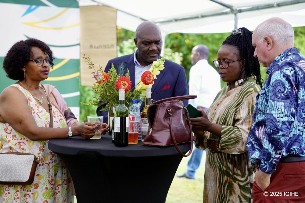 Ambassador Dushimimana Lambert interacting with Rwandans and friends attending the Kwibohora31 celebrations in the Netherlands.