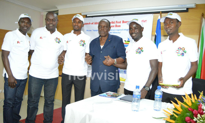 Uganda’s ambassador to Burundi Maj. Gen. Matayo Kyaligonza (in blue) at the lauch of the peace run .