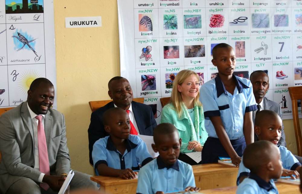 The Director General of Rwanda Education ,Janvier Gasana and US ambassador to Rwanda with other officials and children during the launch of Early Grade Reading Project last week.  