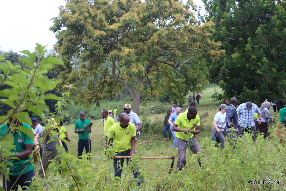 The Management and Staff at Kigali Bus Services (KBS Ltd) with the people of Kagarama sector and Kicukiro came together in communal work to clean around the Nyanza Genocide Memorial site