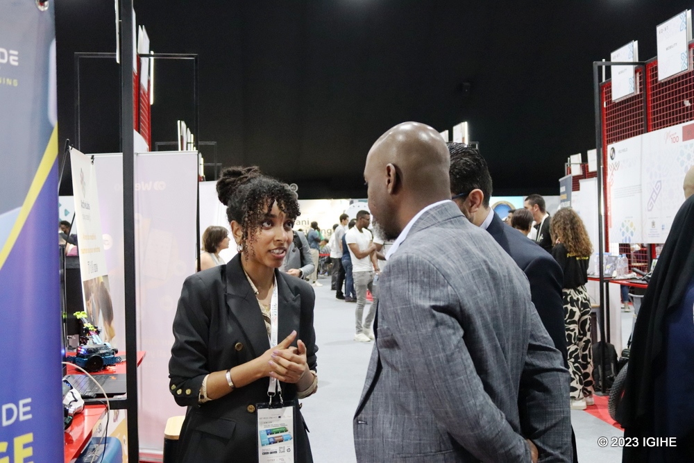 Salma Maroufi, the Marketing and Sales Manager at Active Labs taking a visitor through offered services on the sidelines of GITEX Africa Summit in the Red City of Marrakech, Morocco.     