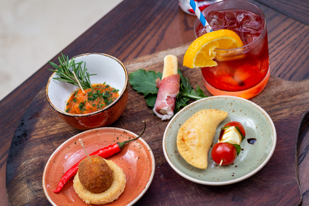 The savory selection of appetizers is done so to beckon one to indulge their senses in preparation for dinner ahead