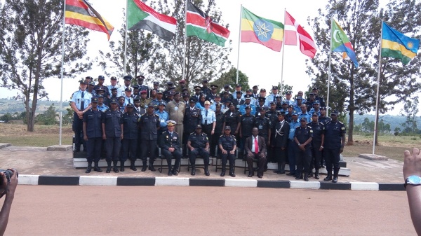 Officials and participants pose in a group photo after the event at the Police Training School (PTS) Gishari in Rwamagana District.