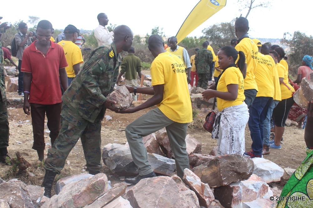 Rwanda Defense Force and MTN Rwanda employees launching construction activities of classrooms yesterday.