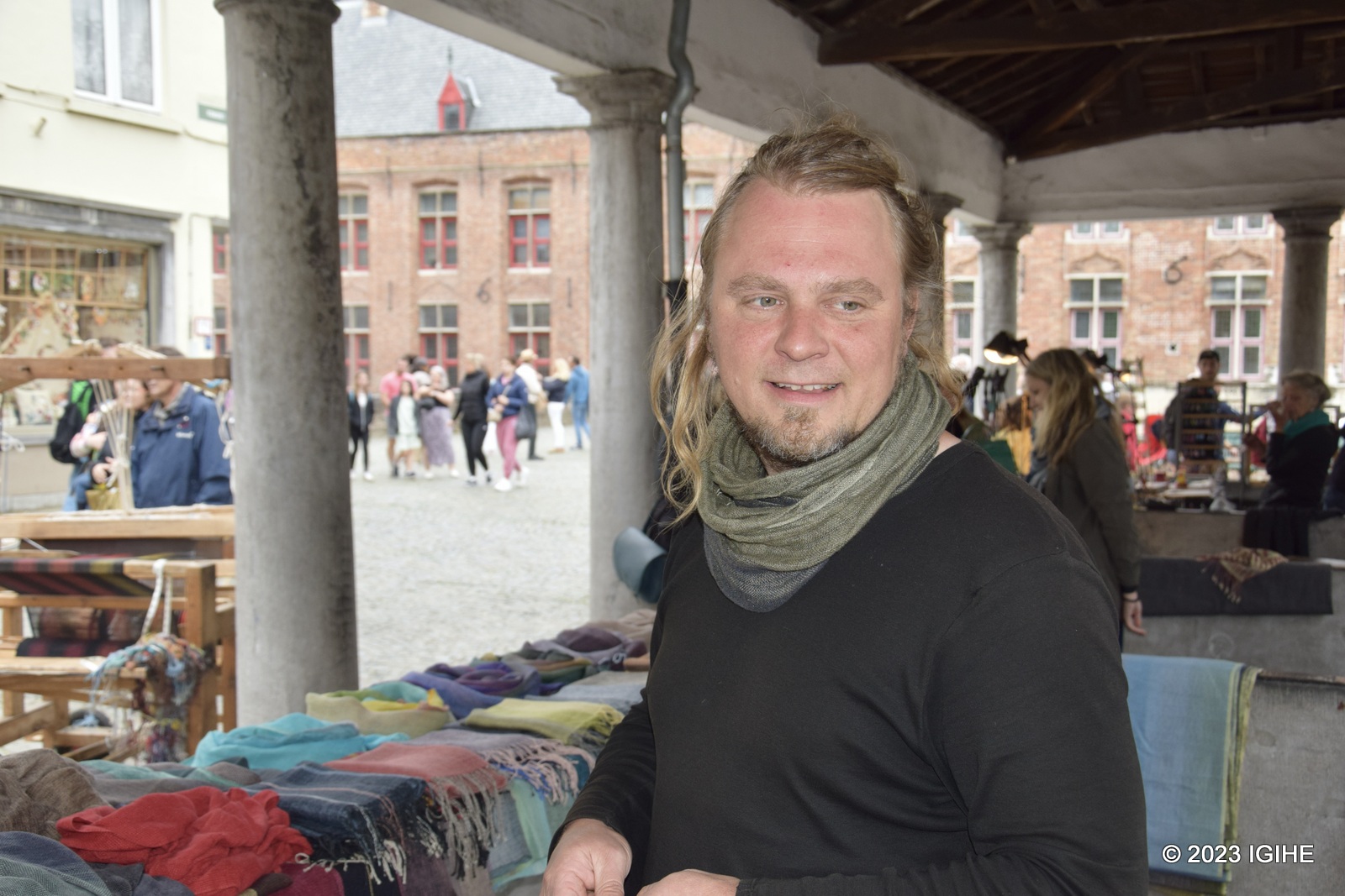 This fashion designer, Janis Rozentalas sews clothes using a traditional sewing machine.