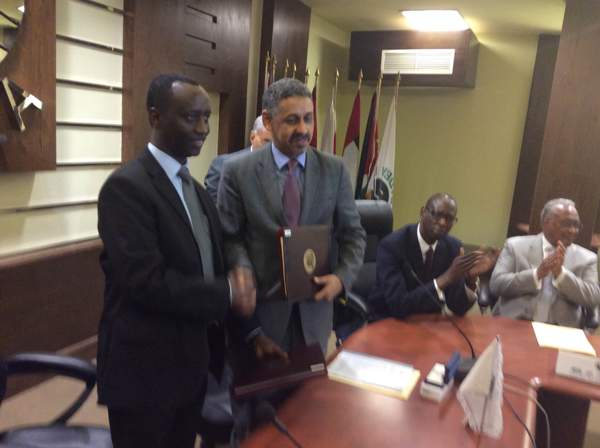 The BRD’s Chief Executive Officer, Alex Kanyankole and the Director General of BADEA, H.E Dr. Sidi OuldTah shake hands after signing agreements