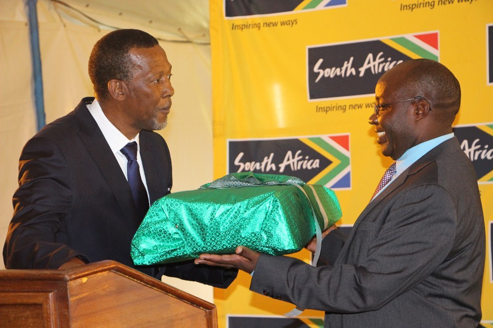 South Africa’s ambassador to Rwanda, George Nkosinati Twala (left) with the State Minister for transport in the Ministry of Infrastructure, Dr Alexis Nzahabwanimana during celebration of 23 years since the end of apartheid yesterday.