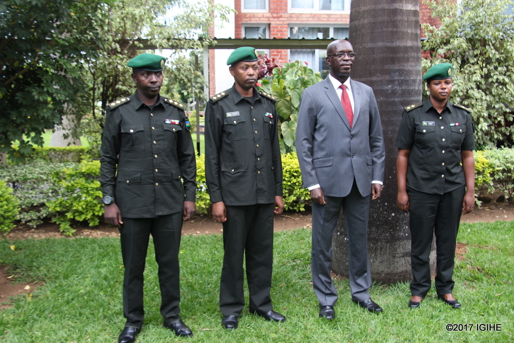 Prime Minister, Anastase Murekezi in a group photo with sworn in Military Prosecutors yesterday.
