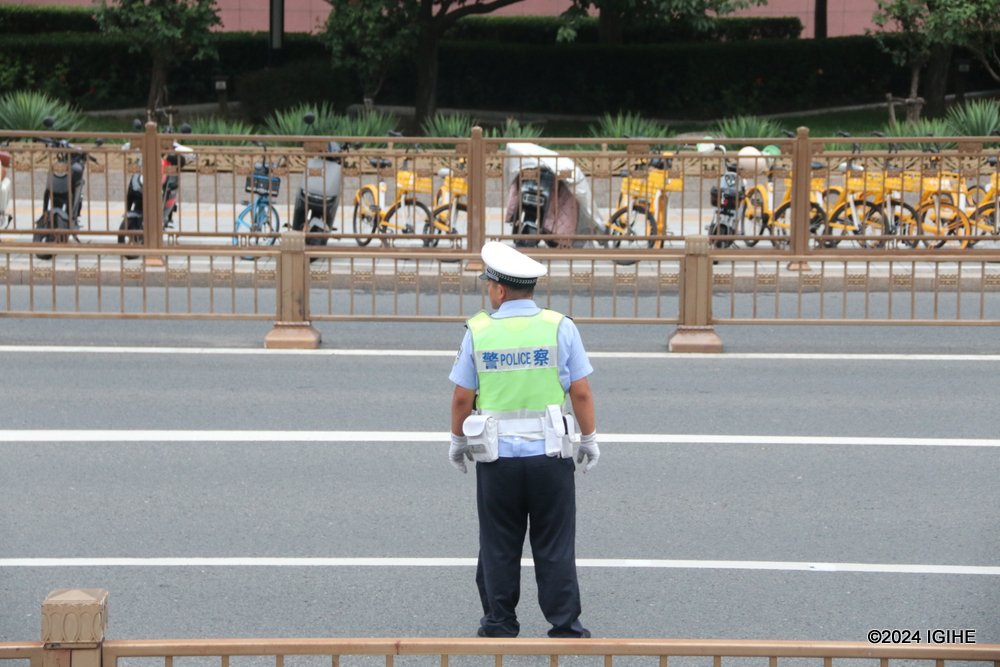 Police officer on duty to ensure smooth traffic.  