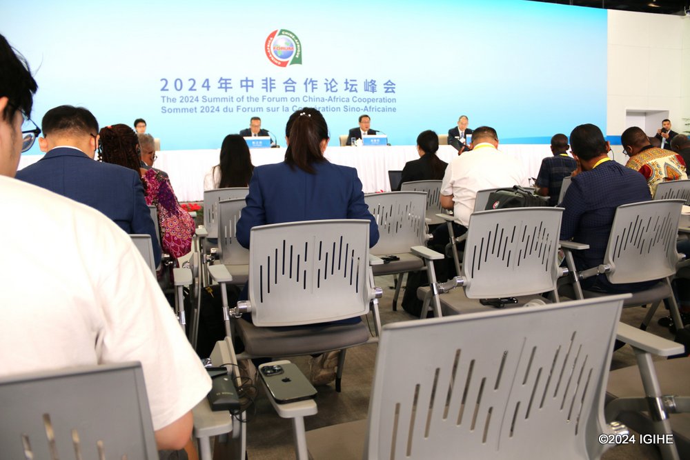 Journalists attending the press briefing in Beijing. 