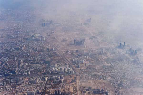 Smog envelops buildings on the outskirts of New Delhi, India.