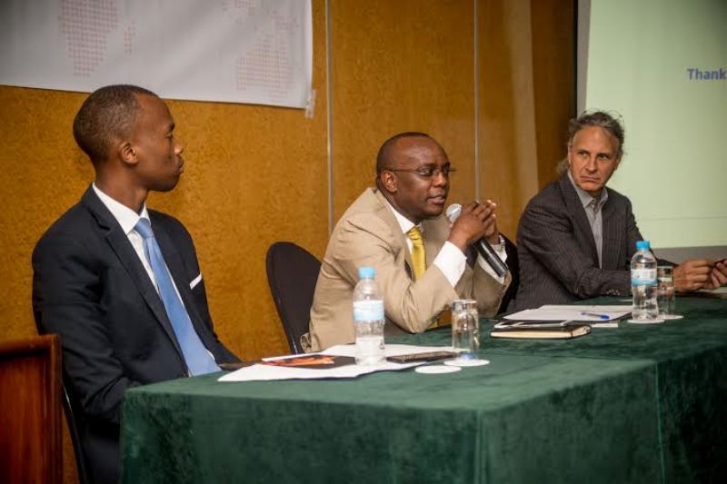 Steve Shema, chief executive officer of Exuus (on the left), Innocent Nzeyimana, chairman of the Irrigation and Mechanization Task Force at RAB and Holecz