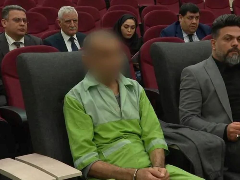 Image from Mizan News shows the attacker, face blurred, sitting in court during his trial over the Azerbaijani embassy shooting. Photo by Iran International 