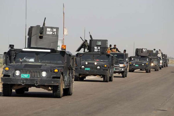 Iraq's counter-terrorism service (CTS) reach al-Sejar village in Iraq's Anbar province on the boundaries of Fallujah on May 28, 2016 as they take part in a major assault to retake the city of Fallujah from the Islamic State (IS) group.